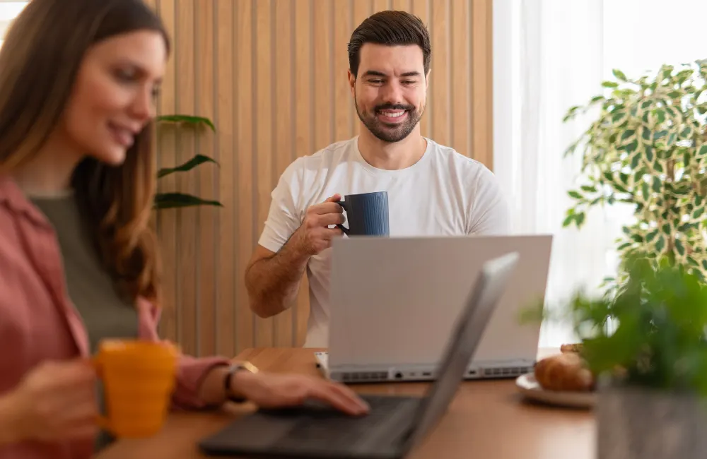 Colleagues using laptops