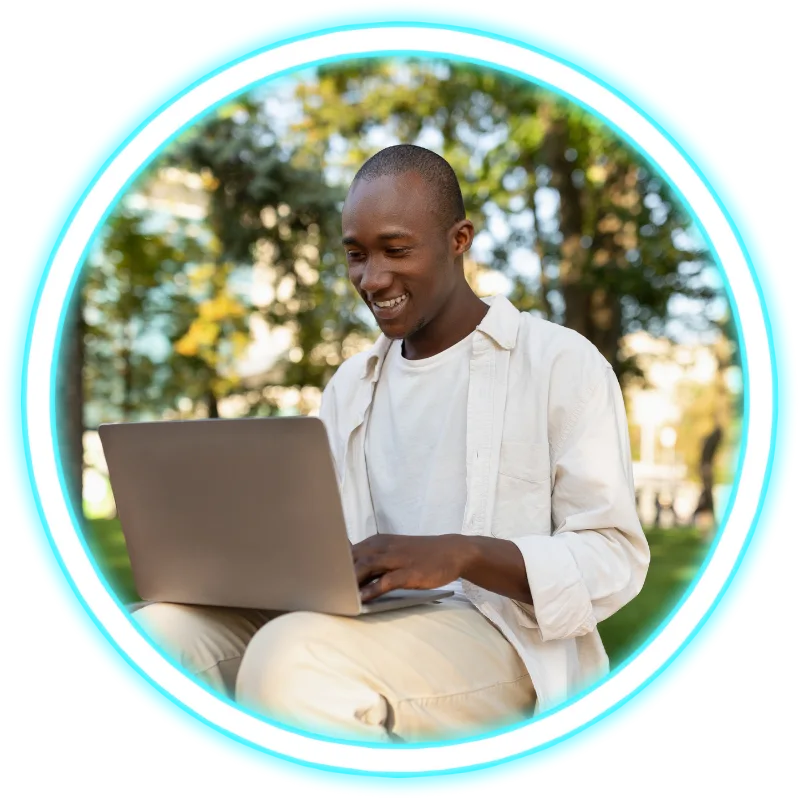 Man outside using laptop